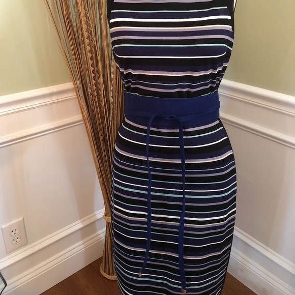 black dress with royal blue accessories